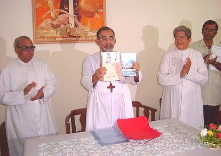 Archbishop Filipe Neri Ferrao releasing the New God Archdiocesan Directory 2006, at the Archbishop's House on 4th August on the occasion of Pastors day