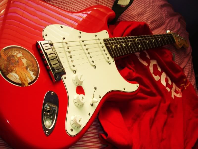 Do you guys put stickers on your guitars? The Gear Page