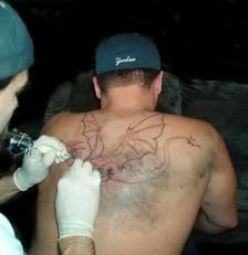 Left handed tattooist!