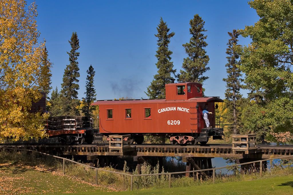 IMAGE: http://i21.photobucket.com/albums/b274/trainboysd40/Heritage%20Park/caboosebridge.jpg