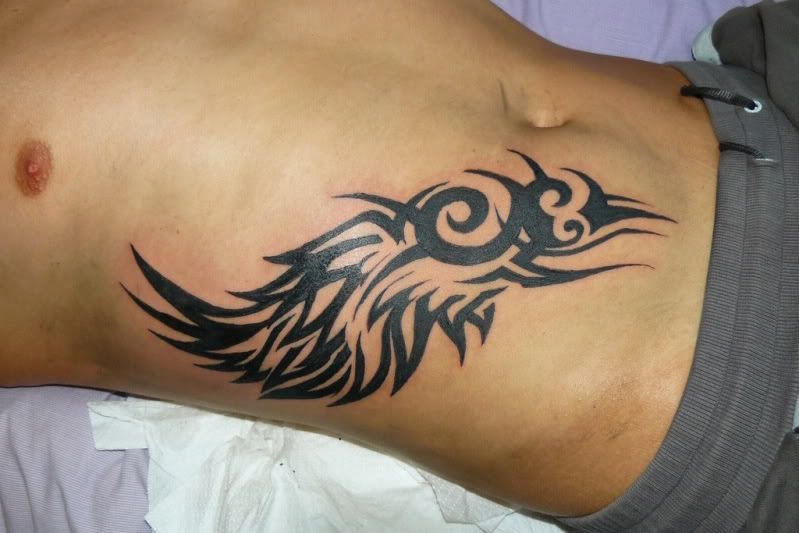 tribal wing tattoos