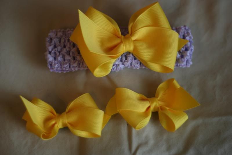 1 med yellow boutique bow and 2 small yellow boutique bows