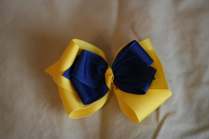 1 med. yellow boutique bow layered with navy blue