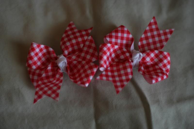 2 small red gingham pinwheel bows