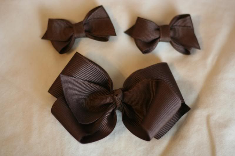 2 Itty Bitty brown bows and 1 medium boutique bow