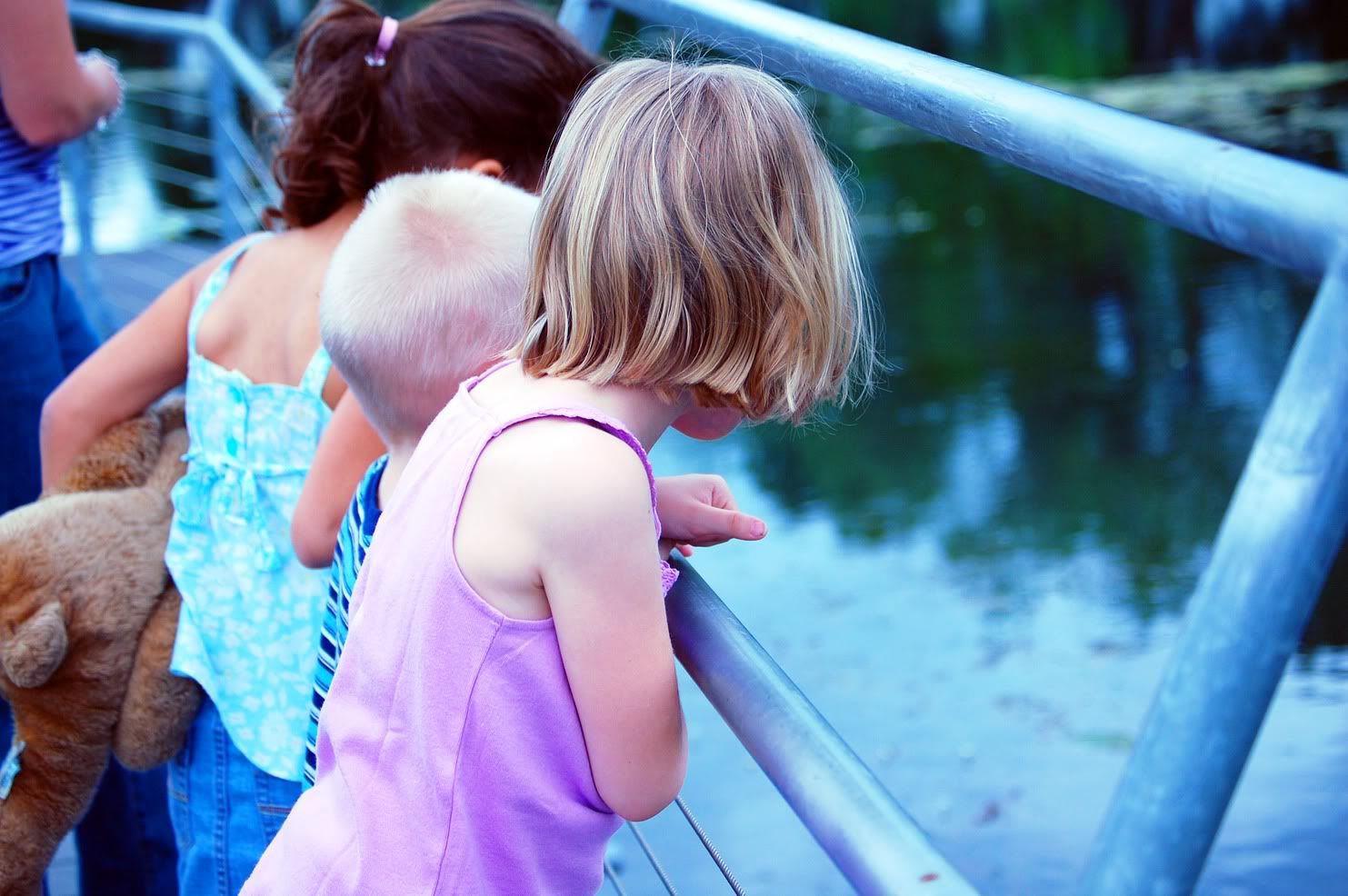 Kids looking at San Marcos River