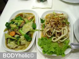 Ging Kalpapruek: Stir-fried mixed vegetables and Thai squid salad