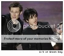 2/3 of Green Day accept their award at the People's Choice Awards [photo: CBS]